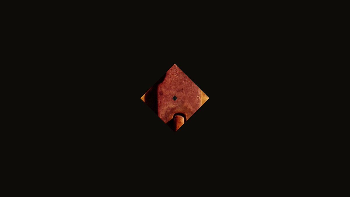 The image features a square-shaped logo with an orange background that reads "Confidential APT. Now on Aptos mainnet. Access it today via @PetraWallet on Android and iOS, and Confidential Assets Web by @AptosLabs". The logo is the central focus of the image, surrounded by a black background.