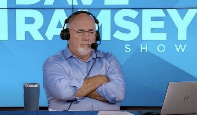In this image, a man wearing glasses is sitting at a desk with his arms crossed while talking into a microphone during an interview or broadcast. The setting appears to be a newsroom or studio environment where Dave Tracey's show is being presented. A laptop can also be seen on the desk in front of him. 

The image includes text that reads "So Solana has printed nine consecutive monthly red candles, @toly?“ That refers to Dave Tracey's show and his name. The post also mentions a coin named Zcash and a coin called Daira's zero-knowledge math is lightyears ahead." This suggests that the image might be related to Dave Tracey's show or an interview featuring him discussing coins like Zcash and Daira's.
