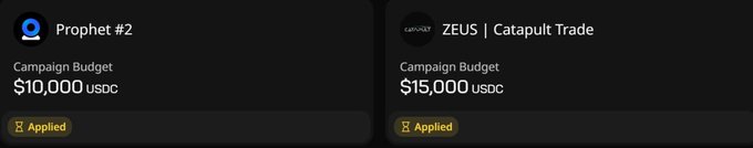 This image shows two campaign listings on Wallchain: "Prophet #2" with a $10,000 USDC budget and "ZEUS | Catapult Trade" with a $15,000 USDC budget, both marked as "Applied". This visually represents the campaigns users may have applied to, where they can now update their post rates.