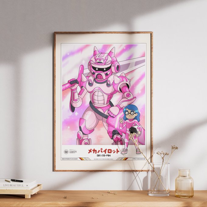A framed poster hangs on a wall, depicting a pink mech robot and a character with blue hair, with the Japanese text 'メカパイロット' at the bottom. A book titled 'LIVE BEAUTIFUL' and glass vases sit on a table beneath the poster.