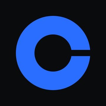 The image displays a large blue "C" logo on a black background, which is the well-known symbol for Coinbase, the cryptocurrency exchange platform referenced in the accompanying post about Chief Legal Officer Paul Grewal's call for Congress to pass pending legislation.