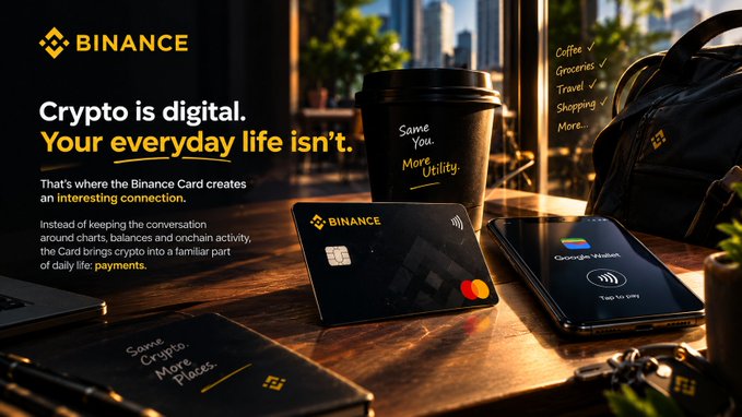 A Binance advertisement showing a black Binance Card next to a Google Wallet phone, with the tagline 'Crypto is digital. Your everyday life isn't.' and lifestyle benefits like Coffee, Groceries, Travel, and Shopping.