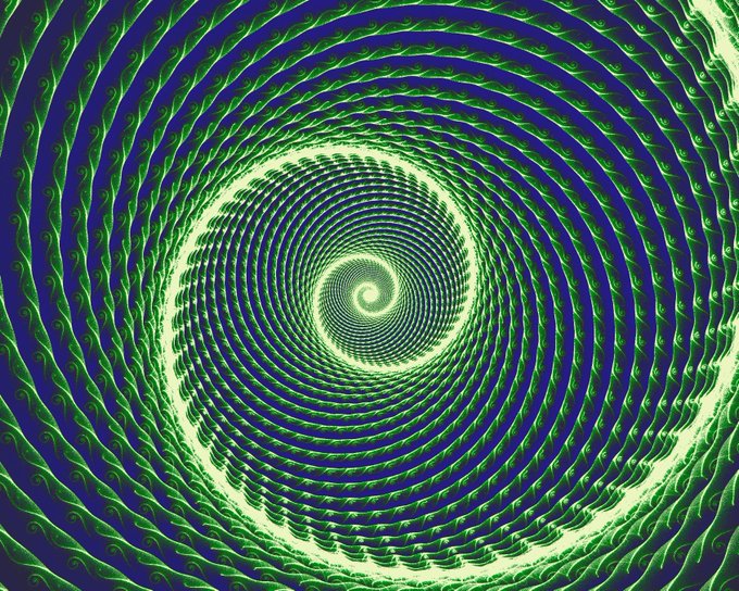 A hypnotic green and blue spiral pattern with intricate scale-like or feather-like details radiating outward from the center in a swirling vortex.