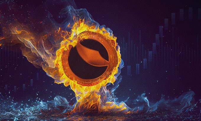 A fiery digital artwork depicting a coin engulfed in flames with a dark center, set against a night sky with faint candlestick stock charts in the background.