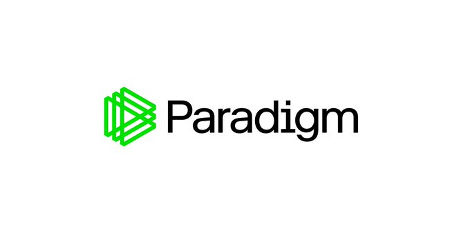 A logo featuring a green geometric layered design next to the word "Paradigm" in black text on a white background.