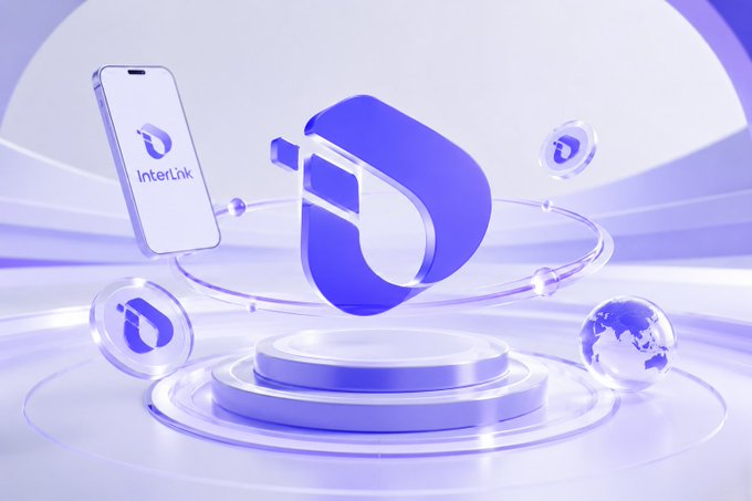The image shows a 3D purple and white promotional graphic featuring the "InterLink" logo on a smartphone display, along with floating bubbles containing the InterLink icon and a globe, all arranged around a circular podium.

The post relates to the image by promoting an InterLink milestone celebration, with the visual reinforcing the brand's identity through its logo and tech-forward, celebratory design.