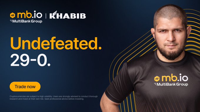 An advertisement featuring Khabib Nurmagomedov for mb.io MultiBank Group with the text 'Undefeated. 29-0.' and a 'Trade now' button.