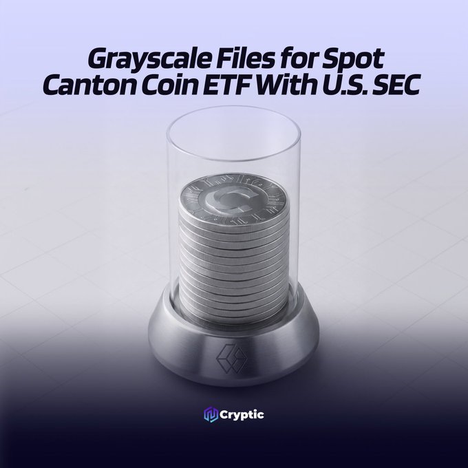 The image features a stack of silver coins placed inside a glass jar or container. The caption above the coins reads "Grayscale Files For Spot Canton Coin EFTWith US Sec". This suggests that the coins are being used as part of an investment strategy, possibly for trading in the cryptocurrency market.
