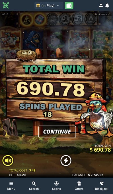 A screenshot of a "Duck Hunters 2" slot game on Duelbits showing a "TOTAL WIN" of $690.78 after 18 spins played, with a total cost of $48 and a remaining balance of $2,745.02, perfectly illustrating the post's celebration of a winning session that "was pure cinema."