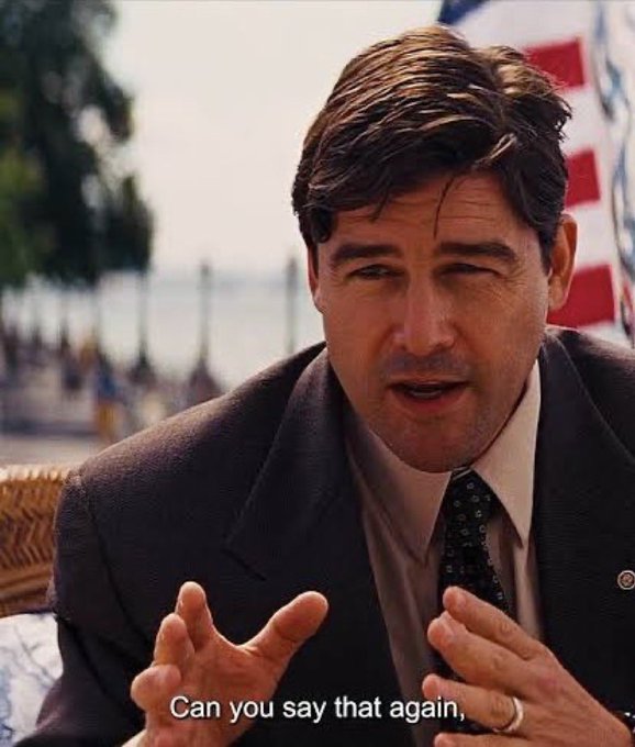 A meme image shows a man in a suit and tie, identified as Bill Melugin, gesturing with his hands and asking 'Can you say that again,'
