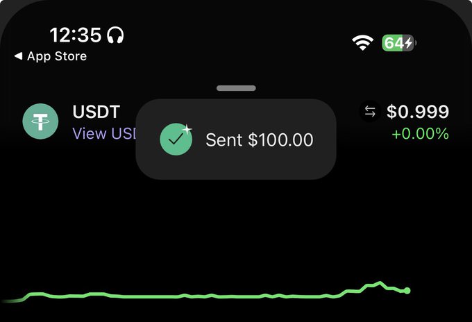 A smartphone screen shows a crypto wallet confirming a $100.00 USDT transaction notification over a USDT price chart displaying $0.999 (+0.00%). The screenshot supports the post's claim of a $100 crypto airdrop being sent to followers.