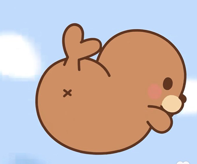 A cartoon illustration of a round, brown bird-like character with an X for one eye, blushing cheeks, and a small tuft on its head, set against a light blue sky background.