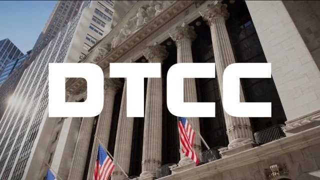 The image shows the New York Stock Exchange building with its iconic columns and American flags, overlaid with the bold white letters "DTCC." This visual connects to the post's announcement about the DTCC (Depository Trust & Clearing Corporation) executing live tokenized asset trades in partnership with Chainlink, JPMorgan, and CME Group, highlighting a major milestone in traditional finance's adoption of blockchain-based collateral management.