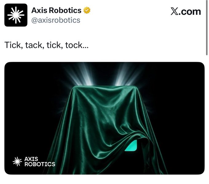A tweet from Axis Robotics (@axisrobotics) with the verified badge reads 'Tick, tack, tick, tock...' above an image of a draped green cloth with light rays behind it and the Axis Robotics logo.