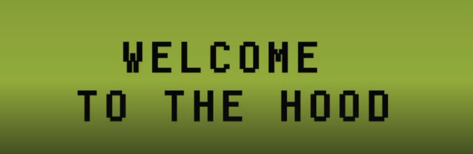 Pixelated black text on a gradient olive-green background reads 'WELCOME TO THE HOOD'.