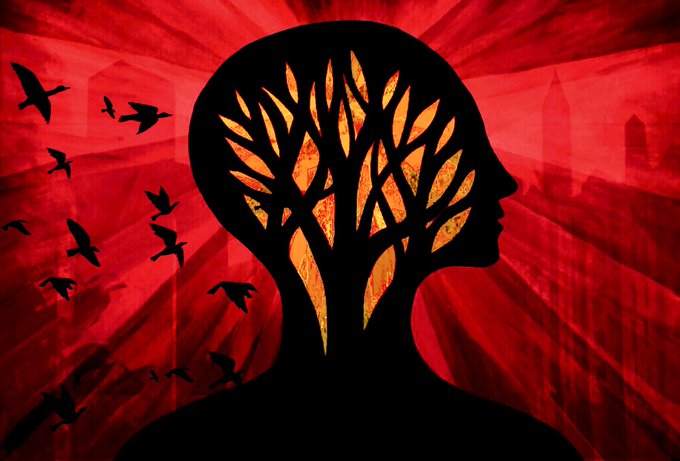 A stylized silhouette of a person's head in profile contains a tree with golden-orange leaves, set against a vivid red background with birds flying and a faint cityscape.