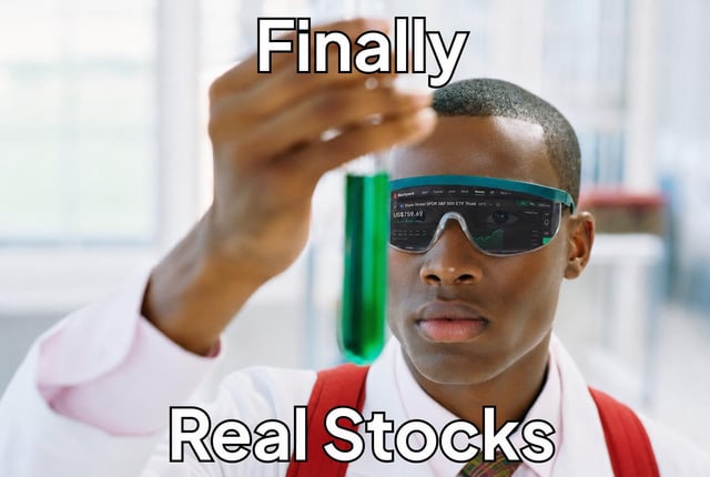 The image features a man wearing glasses, possibly sunglasses, holding up a green liquid or substance that appears to be a test tube filled with a green liquid. The text "Finally Real Stocks" is written above him, indicating that he has just conducted an experiment involving real stocks. The caption below the image reads "Real US stocks are now settling on Solana". This suggests that the man's experiment might have resulted in some interesting data or insights about the stock market and its fluctuations.