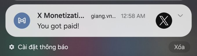 A mobile phone notification from X Monetization stating 'You got paid!' displayed in Vietnamese interface with options to set notification or delete.