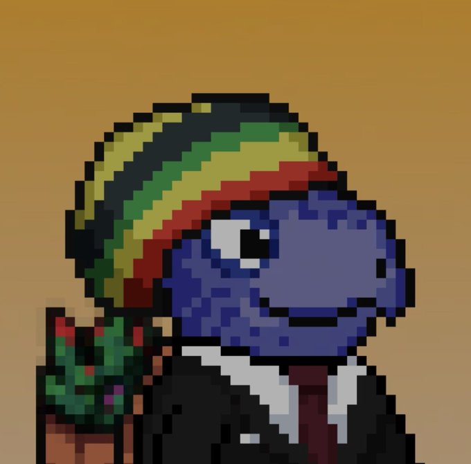 Pixel art portrait of a blue dinosaur character wearing a green, yellow, and red striped beanie and a black jacket over a white shirt.