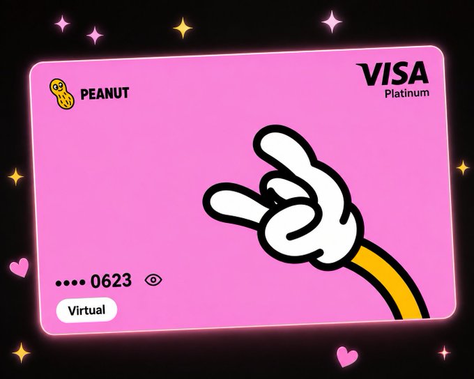A stylized pink VISA Platinum virtual credit card featuring a cartoon gloved hand making a peace sign, the name 'PEANUT', and a card number ending in '0623'.