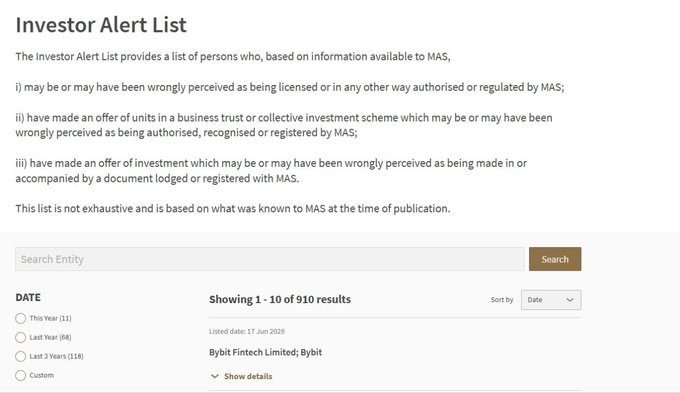 !"The image shows a screenshot of an Investor Alert List page from a financial website, which is titled "Investor Alert List". The main content details are about the warning that has been added to this list by "Bybit Financial Limited (Singapore)". This alert warns about potential investment risks and highlights businesses based on certain criteria. Bybit has been added to this listing as they have notified the Monetary Authority of Singapore, indicating that their business may be subject to regulatory requirements or financial risk assessments."
