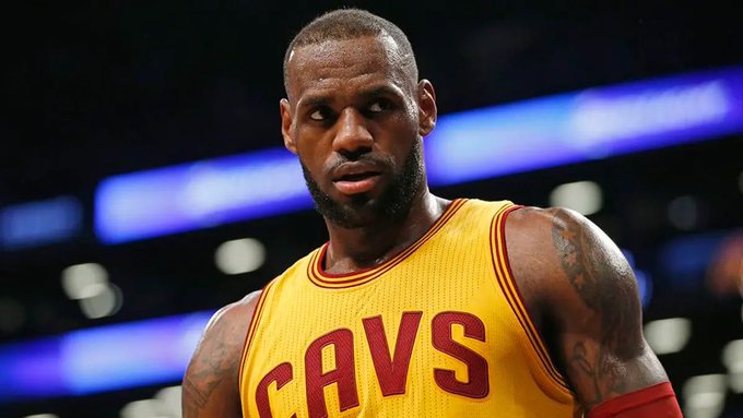 LeBron James, wearing a Cleveland Cavaliers jersey, is shown during a game, visually reinforcing Polymarket's prediction that he is most likely (58%) to return to the Cavaliers rather than the Warriors (18%).