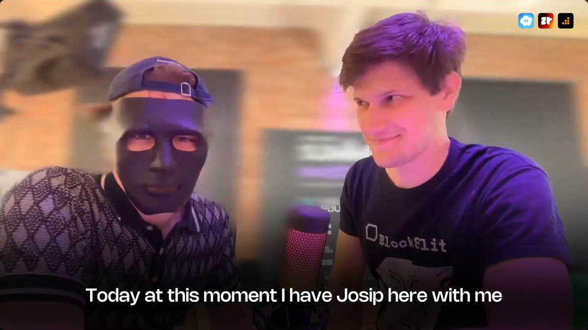 In the image, there are two men wearing masks with one of them holding a microphone while they both appear to be talking into it. The man speaking into the microphone has a caption that reads "Today at this moment I have Josip here with me". This caption suggests that they might be discussing something related to the post or event happening in the image, possibly about the live stream of the Solana Summit Germany taking place on November 14th.