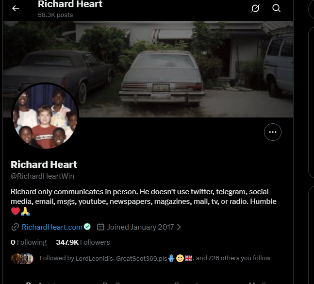 A Twitter/X profile page for Richard Heart (@RichardHeartWin) showing 347.9K followers, 58.3K posts, joined January 2017, and verified. The bio reads: "Richard only communicates in person. He doesn't use twitter, telegram, social media, email, msgs, youtube, newspapers, magazines, mail, tv, or radio. Humble" The header image shows two cars in a driveway.