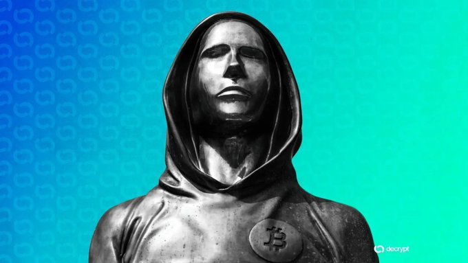 A hooded, metallic statue bearing the Bitcoin logo stands against a teal gradient background with subtle Bitcoin symbols, evoking the mysterious "Satoshi Nakamoto" figure central to the film "Killing Satoshi," a $70 million Bitcoin movie starring Casey Affleck.