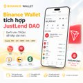 A Binance Wallet promotional graphic showing a mobile app interface with the text "tich hop JustLend DAO" and various cryptocurrency logos.