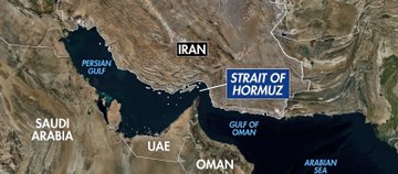 A detailed map of the Strait of Hormuz, with Iran, Saudi Arabia, and Oman shown clearly marked. The surrounding area includes a wide expanse of water surrounded by desert terrain. A blue mark appears to indicate the passage of ships through the strait over time. The map also shows a large body of water labeled as "UAE" in white color. In the image's caption, it is described that Iran and other countries have been dealing with the Strait of Hormuz since the ceasefire began due to heavy traffic generated by vessels passing through, creating revenue for Iran, which has resulted in de-dollarization in action.