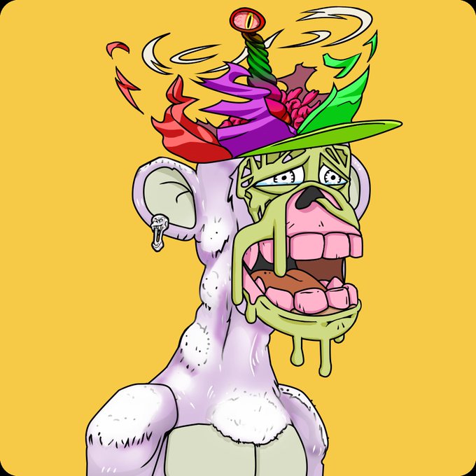 A colorful cartoon illustration of a wild-eyed monkey wearing a chaotic jester hat with feathers and swirls, showing large buck teeth against a yellow background.