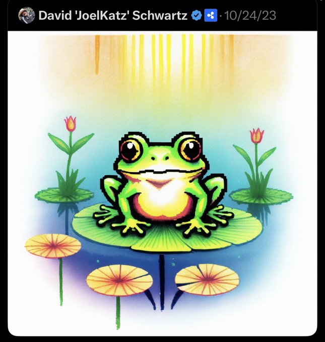 A screenshot of a Telegram post by David 'JoelKatz' Schwartz dated 10/24/23 featuring a vibrant cartoon illustration of a green frog sitting on a lily pad with pink flowers and a rainbow in the background.