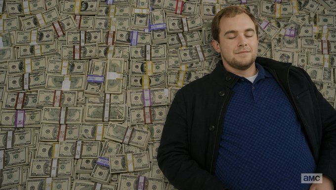 A man stands with his eyes closed in front of a wall covered in stacks of $50 bills, with an "amc" logo in the corner, evoking themes of wealth and wealth accumulation that playfully contrast with the post's discussion of selling options and trading fees on the Variational platform.