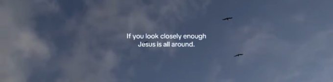 A view of a cloudy sky with two small birds in flight and overlaid white text reading "If you look closely enough Jesus is all around."