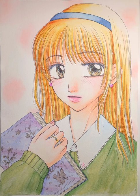 A watercolor illustration of a young woman with long blonde hair, a blue headband, and a green sweater holding a purple book with floral designs.
