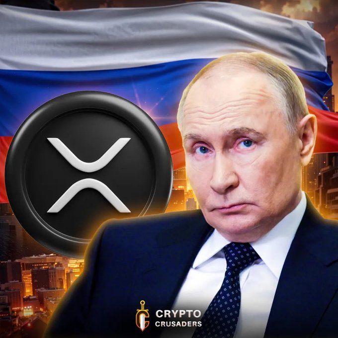 A graphic featuring Vladimir Putin alongside the XRP cryptocurrency logo, with a Russian flag in the background and 'CRYPTO CRUSADERS' branding at the bottom.
