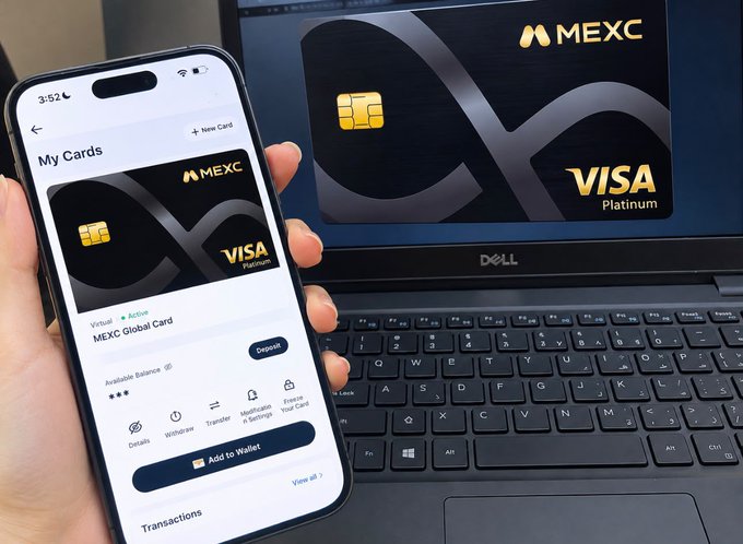 A hand holds a smartphone displaying the MEXC app with a virtual Visa Platinum card, with the physical card design shown on a laptop screen in the background.