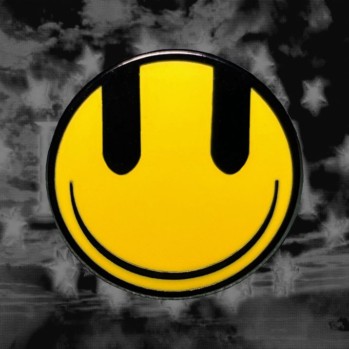 A yellow smiley face pin with black-outlined eyes and smile is displayed against a smoky, grayscale background. The image pairs with the "$CULT" morning post, evoking a nostalgic, edgy vibe fitting the token's rebellious aesthetic.