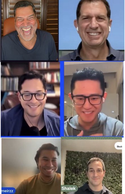 A 2x3 grid video call screenshot showing six smiling men, with the bottom-left labeled 'meirzz' and the bottom-right labeled 'Shalek Bock'.
