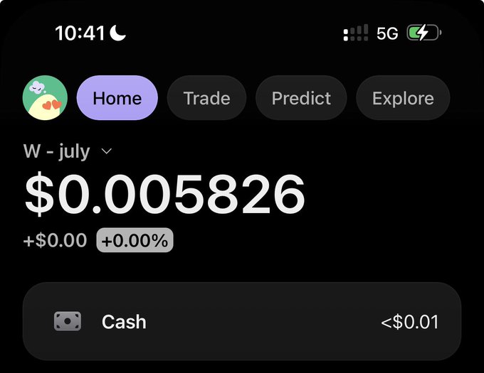 The image shows a screenshot of a crypto/investment app with a portfolio balance of $0.005826 for "W - july," displaying a Cash holding of less than $0.01 with navigation tabs for Home, Trade, Predict, and Explore. This represents the starting point of the user's "$0 to $20k challenge for July," illustrating their very beginning balance as they embark on the ambitious month-long goal using strategies like exchange listing affiliates.