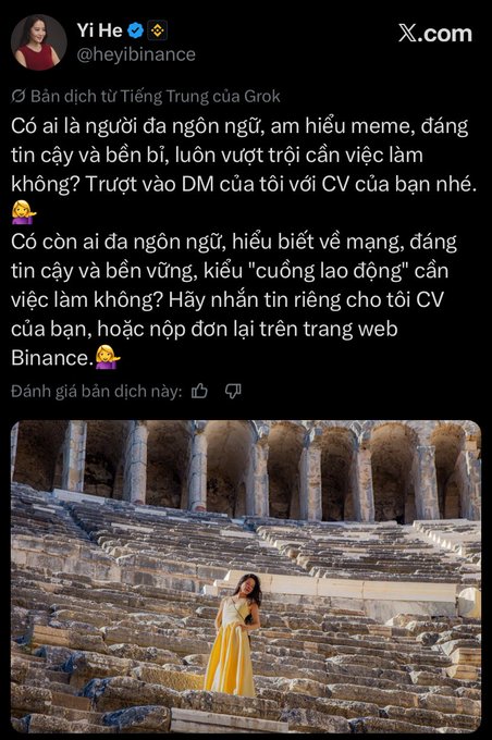 A tweet from Yi He (@heyibinance) translated from Chinese, recruiting meme-savvy, reliable candidates for job opportunities at Binance, featuring a photo of a woman in a yellow dress at ancient Roman ruins.