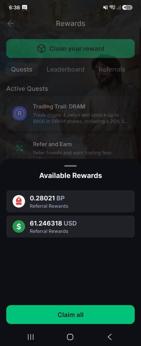 A mobile rewards screen titled 'Rewards' showing a 'Claim your reward' button, active quests including 'Trading Trail: DRAM' and 'Refer and Earn', and available referral rewards of 0.28021 BP and 61.246318 USD.