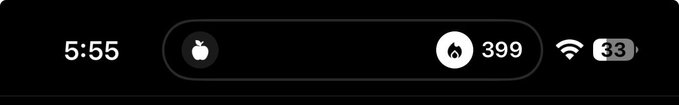 A digital display shows the time 5:55 alongside an Apple logo, a flame icon with "399", a WiFi symbol, and battery at 33%.