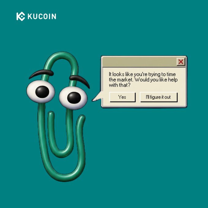 A green paperclip character with a worried expression stands next to a classic pop-up dialog box reading "It looks like you're trying to time the market. Would you like help with that?" with "Yes" and "I'll figure it out" buttons, humorously illustrating the common trader's overconfidence in market timing decisions. The KuCoin logo appears in the top left, tying the meme to their crypto trading platform.