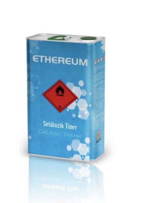 A blue metal container labeled "ETHEREUM" with the subtitle "Selülozik Tiner / Cellulosic Thinner," featuring a flammable hazard symbol (flame icon with "3"), visually tying the cryptocurrency's name to a can of literal thinner in a humorous play on "burning" Ethereum.