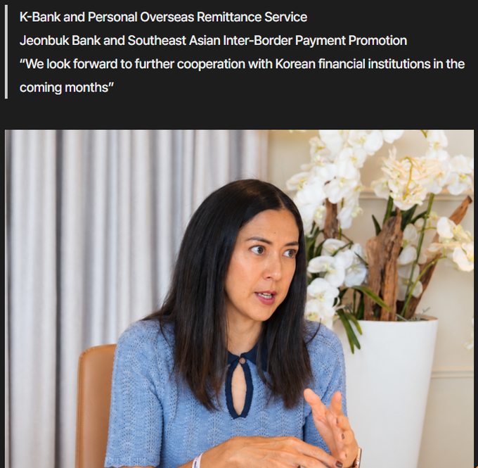 An article image featuring a woman in a blue top being interviewed, with the headline 'K-Bank and Personal Overseas Remittance Service / Jeonbuk Bank and Southeast Asian Inter-Border Payment Promotion / "We look forward to further cooperation with Korean financial institutions in the coming months"'.