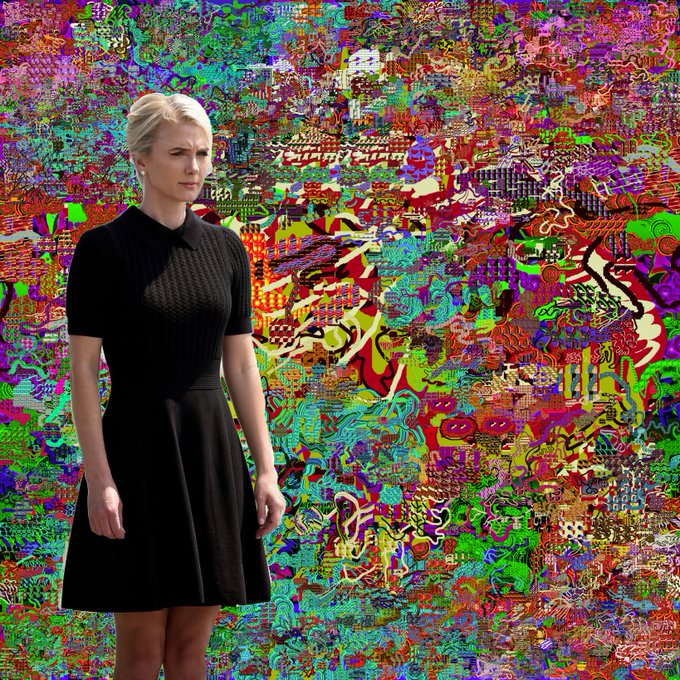 A digital composite showing a blonde woman in a black collared shirt and skirt standing against a chaotic, brightly colored abstract background filled with glitch-art patterns.