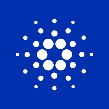 The image displays the Cardano ($ADA) logo, a white circular dot pattern on a blue background, representing the cryptocurrency mentioned in the post about Cardano's progress toward SEC-regulated spot ETF eligibility.