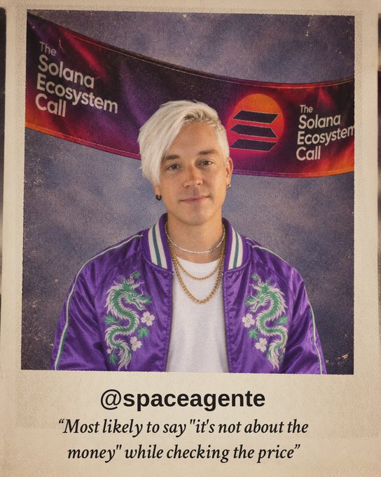 A Polaroid-style photo of a person with two-toned hair (blonde on one side, dark on the other) wearing a purple dragon-embroidered jacket and gold chains, standing in front of 'The Solana Ecosystem Call' banner, labeled '@spaceagente' with the caption 'Most likely to say "it's not about the money" while checking the price'.